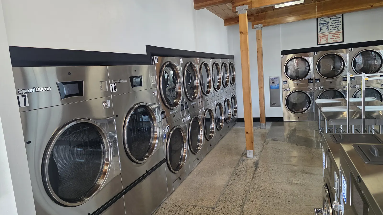 The 80 pound mega load washers at Jerome Handy Wash, the largest machines in the store, next to a bank of stacked dryers
