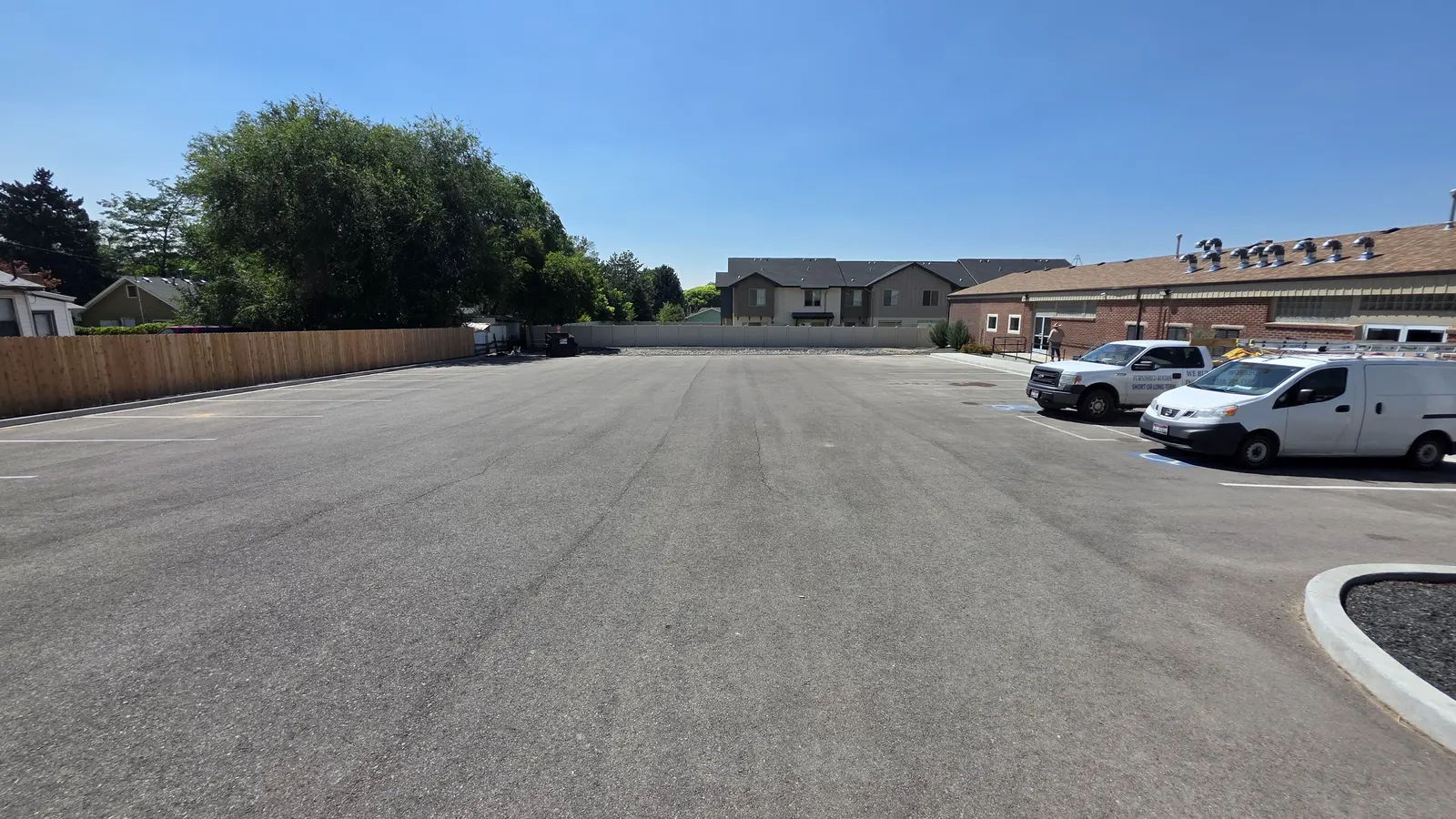 The large paved parking lot at Jerome Handy Wash with room to turn a truck or trailer around